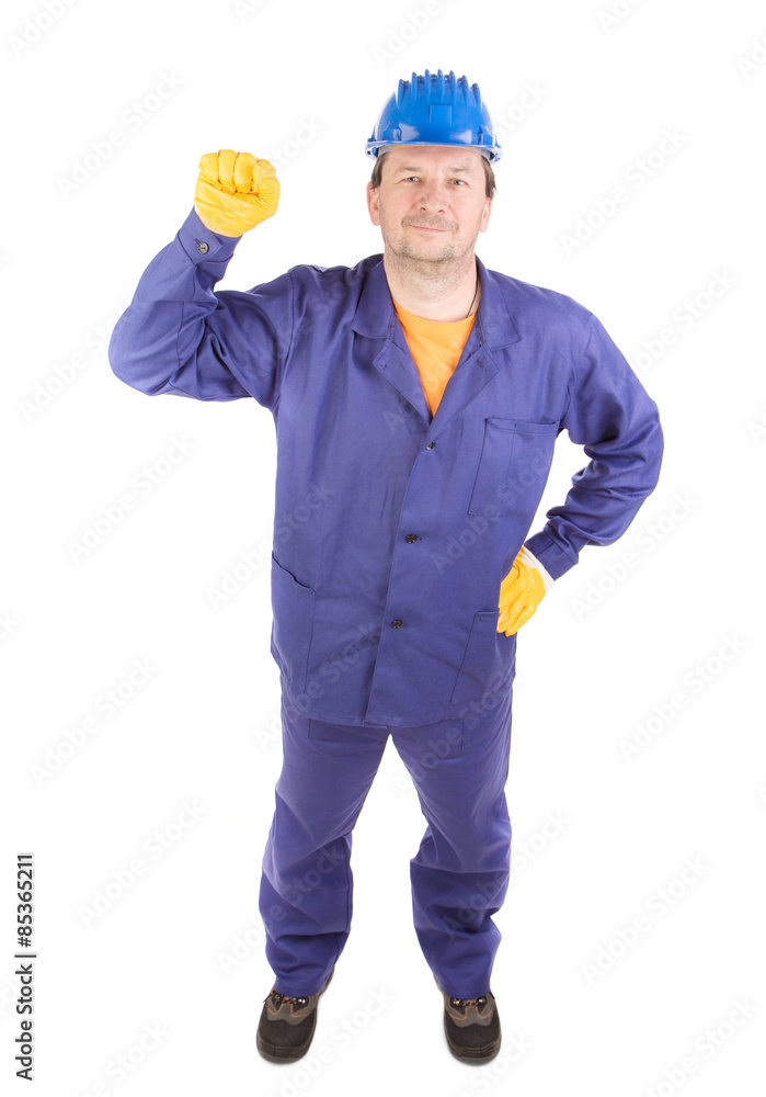 Man in working clothes with fist. Man in working clothes with fist.