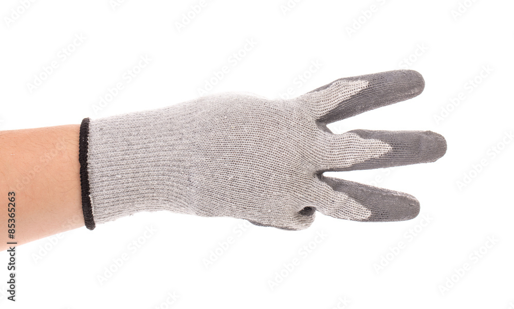 Hand in gloves shows three. Hand in gloves shows three.