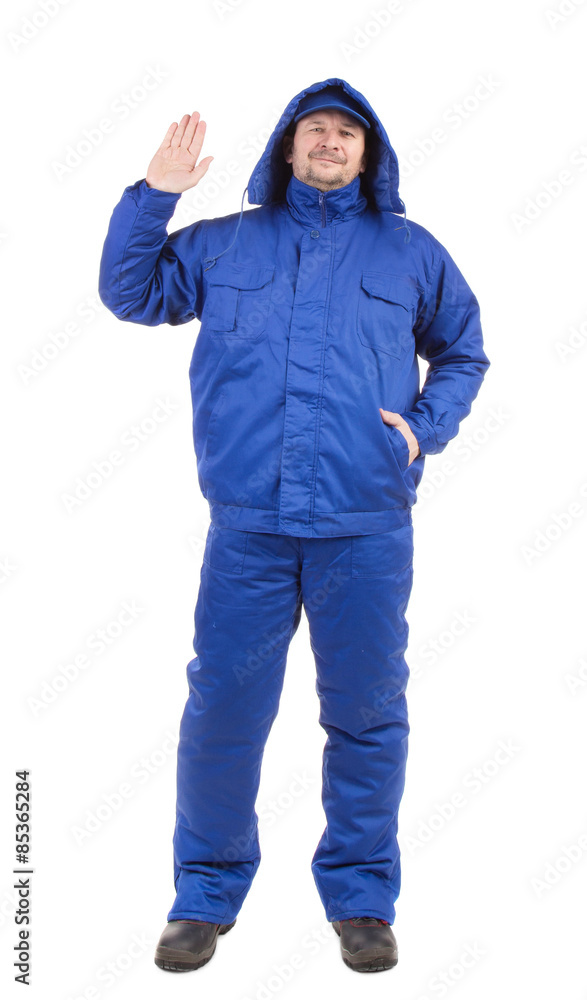 Worker in blue workwear. Worker in blue workwear.
