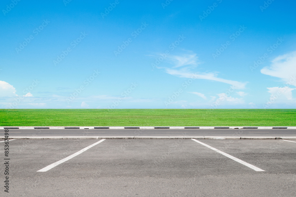 Fototapeta premium Empty parking area with sky landscape