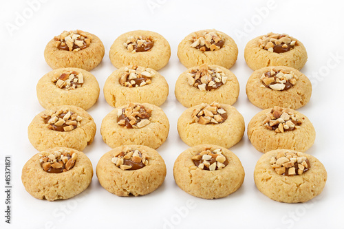 cookies with salted caramel and peanuts on a white background