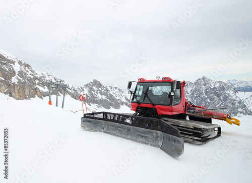 Machines for skiing slope preparations at mountain Zugspitze in Germany Europe- nature and sport background
