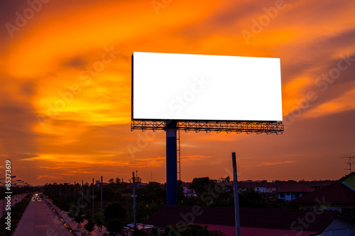 Blank billboard for new advertise on beautiful sunset sky background.