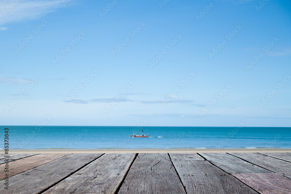 sky and ocean with wooden berth