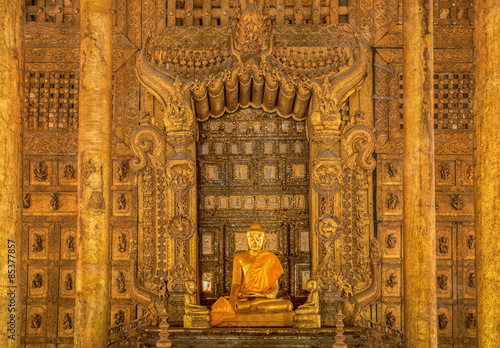 Vintage Shwenandaw Kyaung temple in Mandalay historical park photo