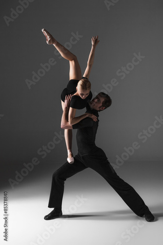 two young modern ballet dancers on gray studio background  © master1305