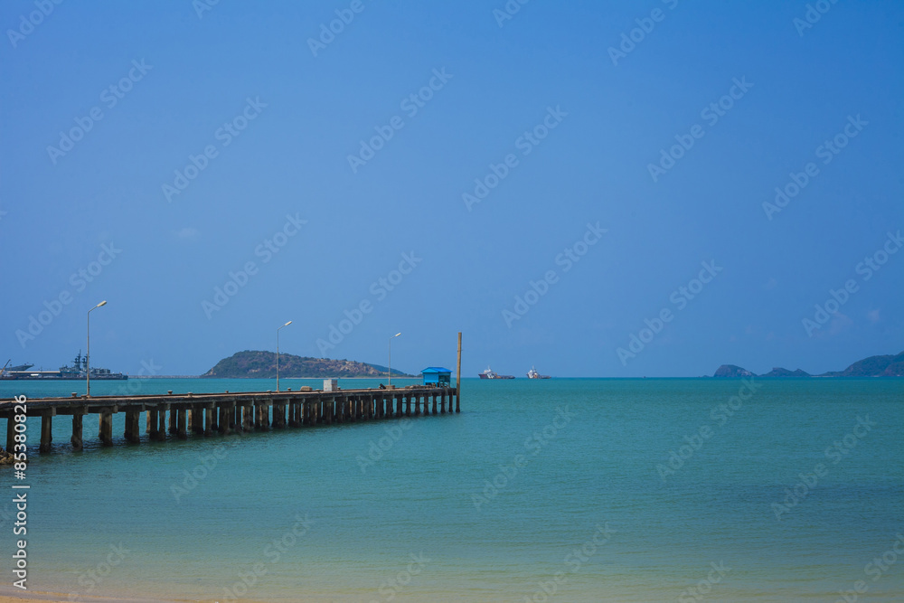 The bridge extends into the sea