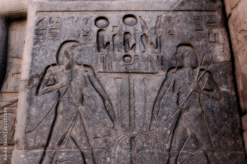 Carving of hieroglyphs in temple in Egypt