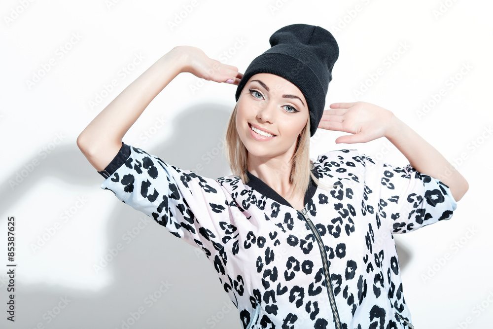 Girl posing with hands near head Girl posing with hands near head