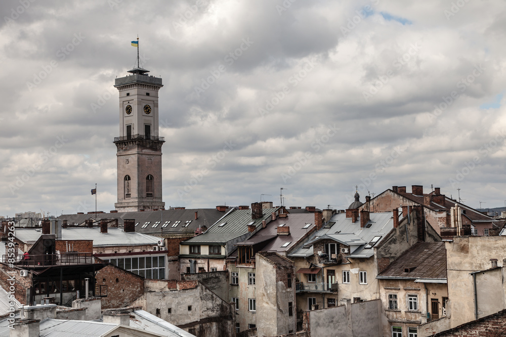 High tower among old roofs, Lviv