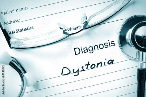 Diagnosis Dystonia and tablets. Medicine concept.