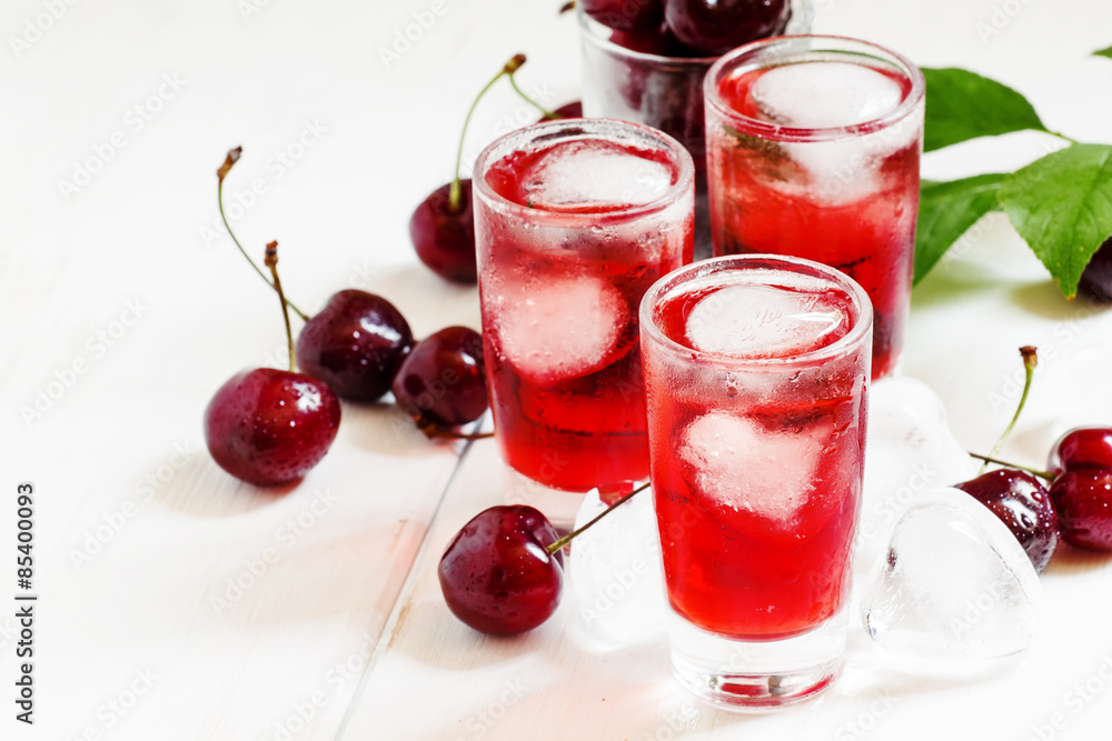 Ice red drink with ice in a heart shape, selective focus Ice red drink with ice in a heart shape, selective focus