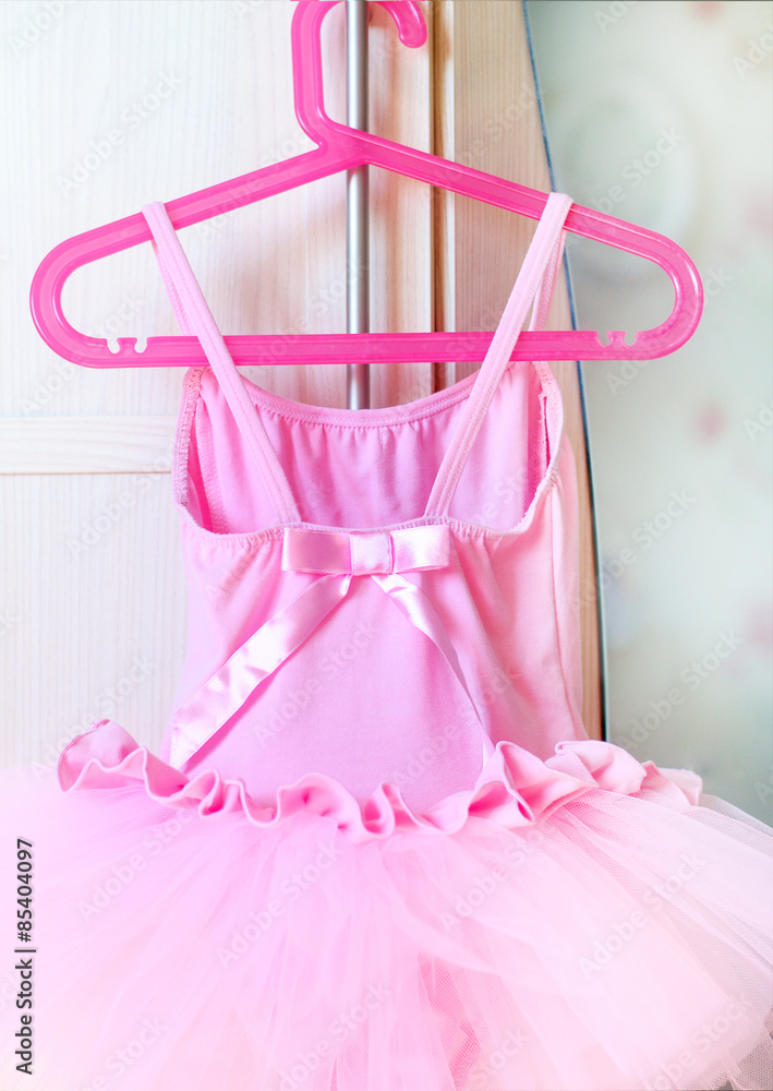 Girl's pink dress of delicate pink fabric Girl's pink dress of delicate pink fabric