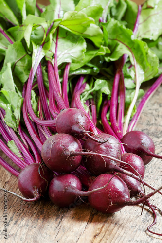 Fresh organic beetroot with tops, selective focus