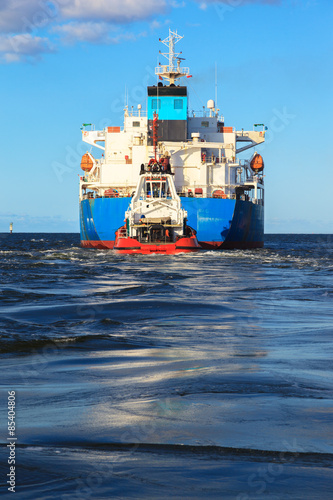 Large tanker ship on route to sea.