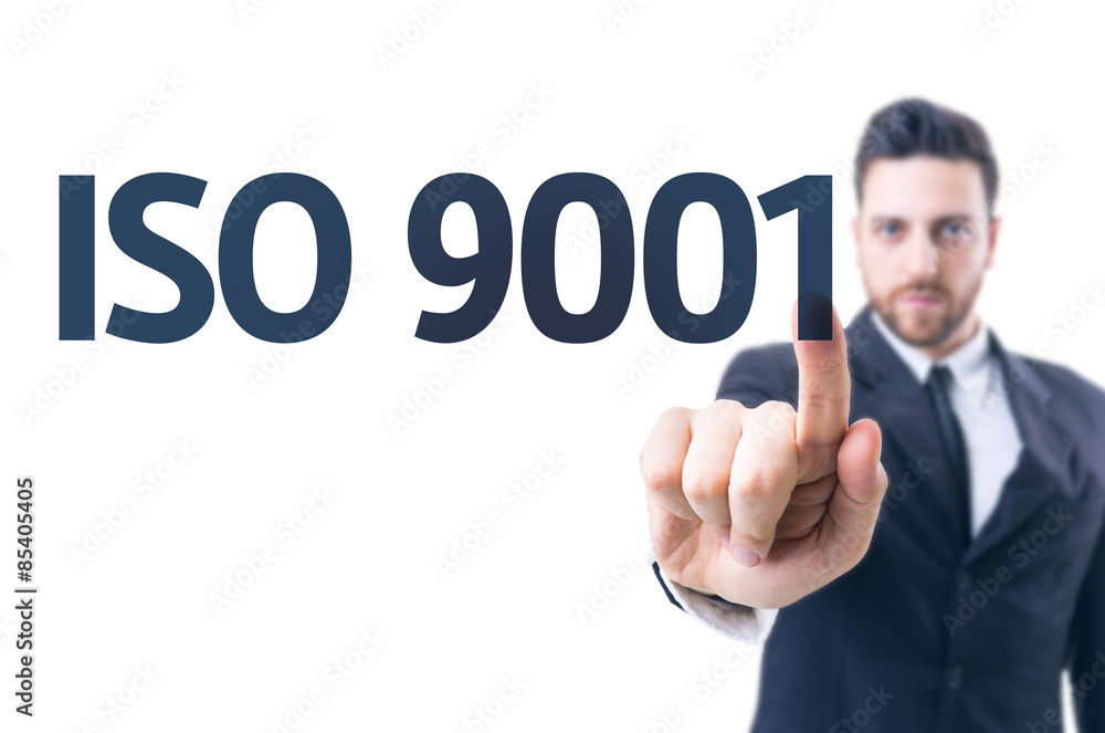 Business man pointing the text: Iso 9001 Business man pointing the text: Iso 9001