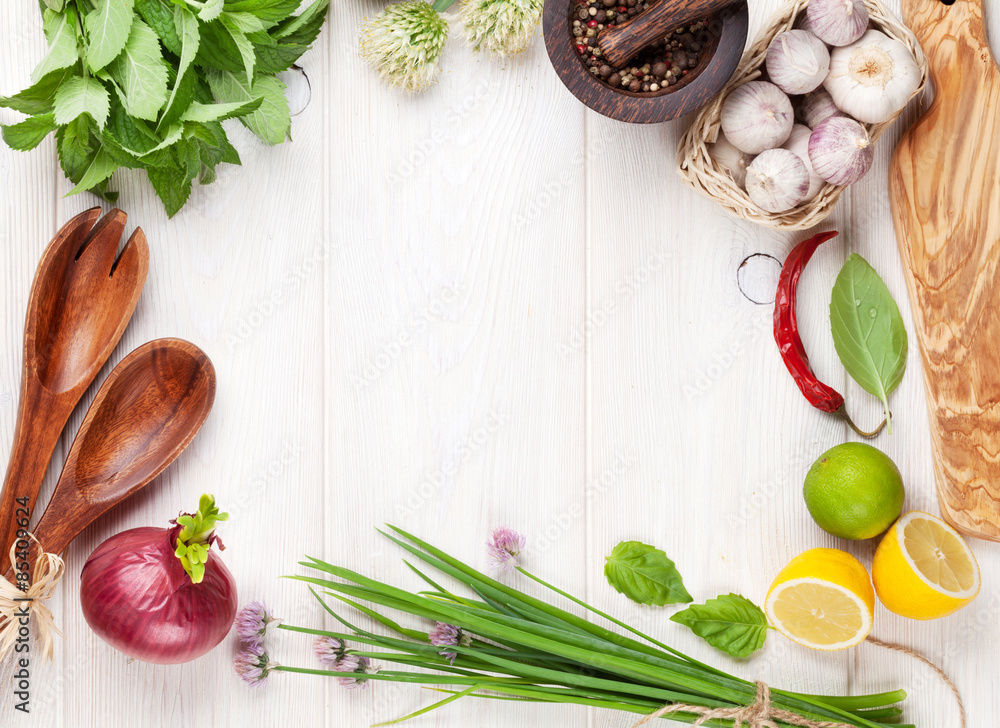 Fresh herbs and spices on wooden table Fresh herbs and spices on wooden table