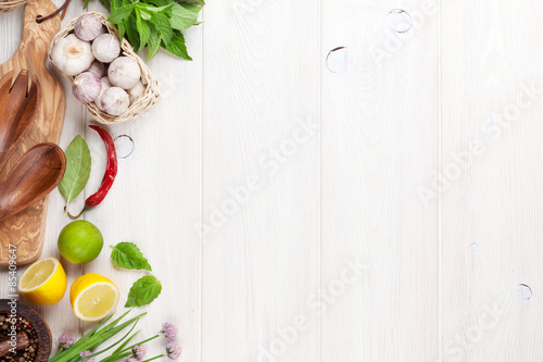 Fototapeta Naklejka Na Ścianę i Meble -  Fresh herbs and spices on garden table