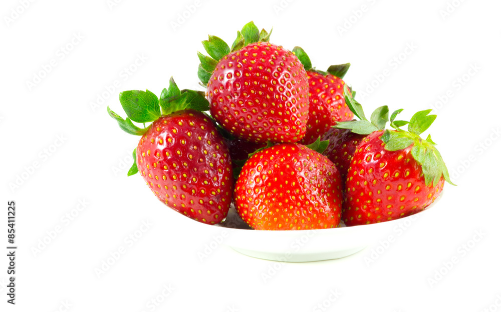 Several strawberries on a saucer Several strawberries on a saucer