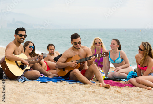 Friends play guitar