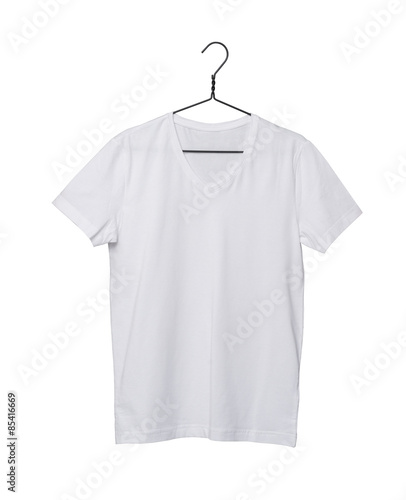 Close-up of the white t-shirt on the clothes hanger. Isolated on white background.