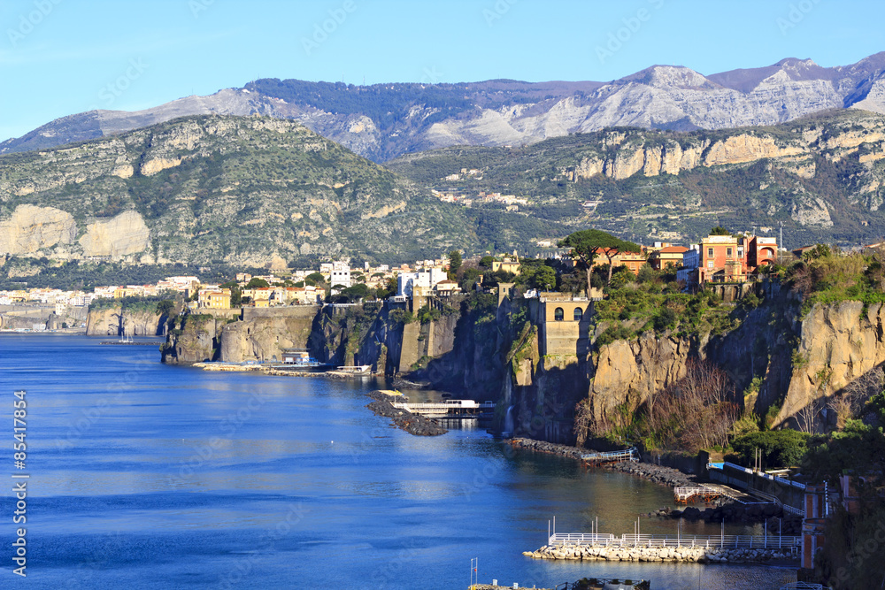 Landscape of the Sorrento town nea Naples, one of the most beautiful places of the Amalfi coast, with sea foreground and mountains background 