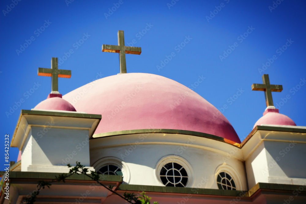 Holy Church - Roof of a church with a crucifix sculptures Holy Church - Roof of a church with a crucifix sculptures