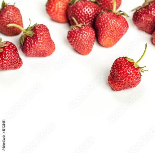 fresh organic strawberry over white background. fruit