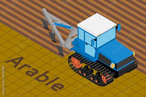 Agricultural crawler tractor with plow tillage a field.