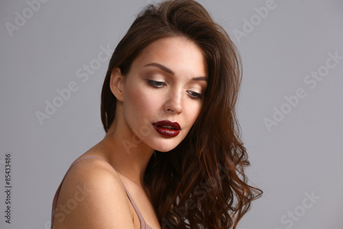 Portrait of beautiful woman , isolated on gray background