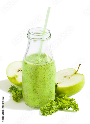 Green juice in bottle. Healthy drink.