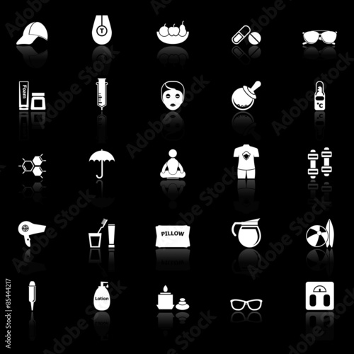 Facial and body treatment icons with reflect on black background