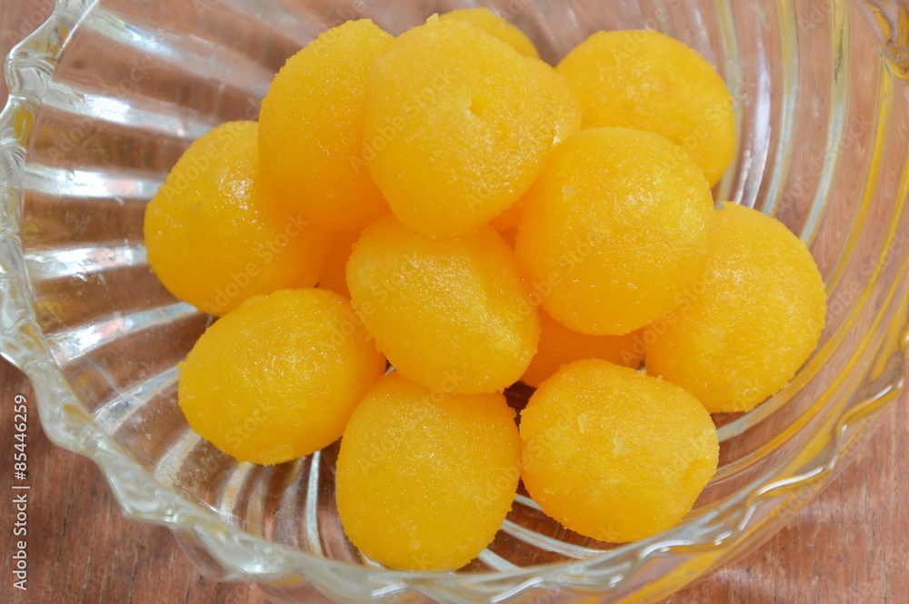 gold egg yolk drop Thai sweet in bowl gold egg yolk drop Thai sweet in bowl