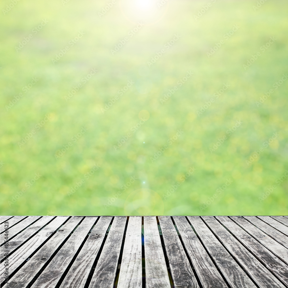 old wooden floor platform on green leaf and flower nature backgr old wooden floor platform on green leaf and flower nature backgr