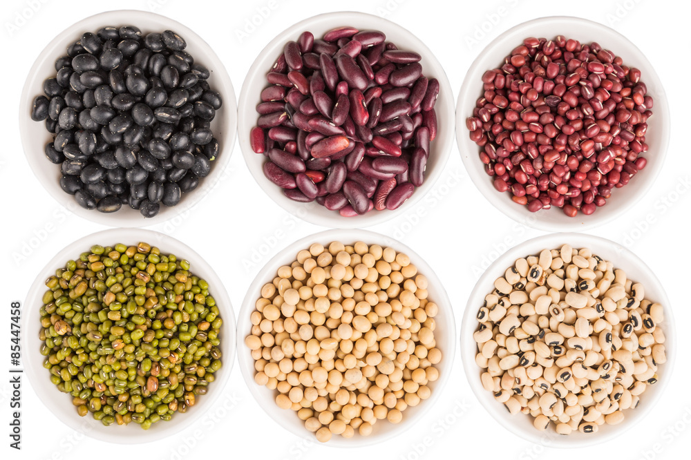 Beans variety in white bowl over white background Beans variety in white bowl over white background
