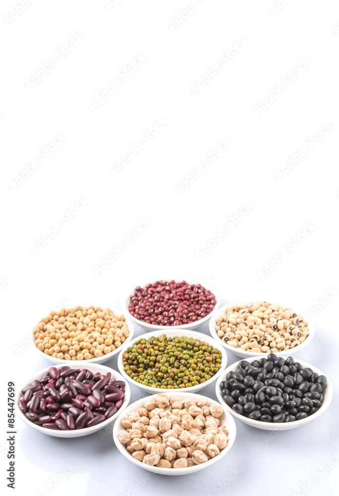 Beans variety in white bowl over white background Beans variety in white bowl over white background