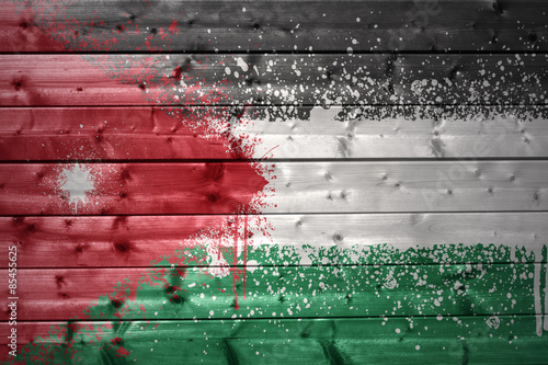 painted jordan flag on a wooden texture