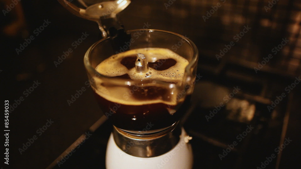 delicious Italian coffee steaming in the mocha cofeepot. (high definition, 1920x1080, 1080p) delicious Italian coffee steaming in the mocha cofeepot. (high definition, 1920x1080, 1080p)