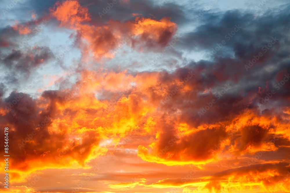 Flaming red fire in the sky cloudscape background
