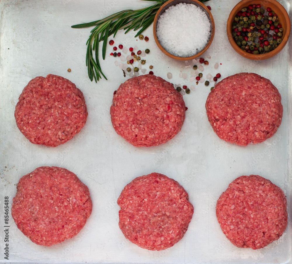 Cooking of burgers from beef. selective focus Cooking of burgers from beef. selective focus