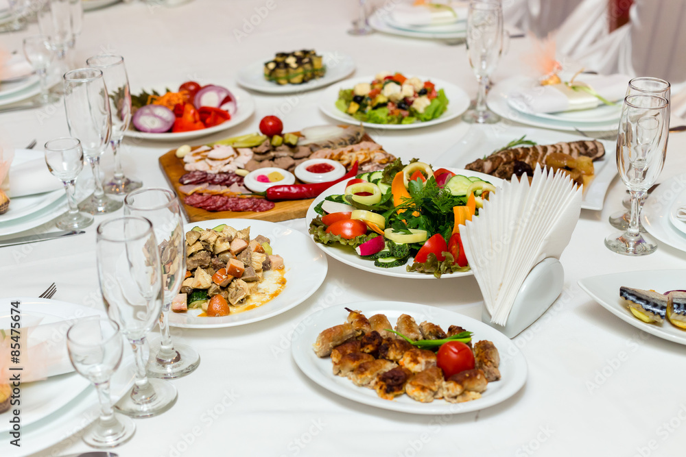 Dishes on the banquet table Dishes on the banquet table