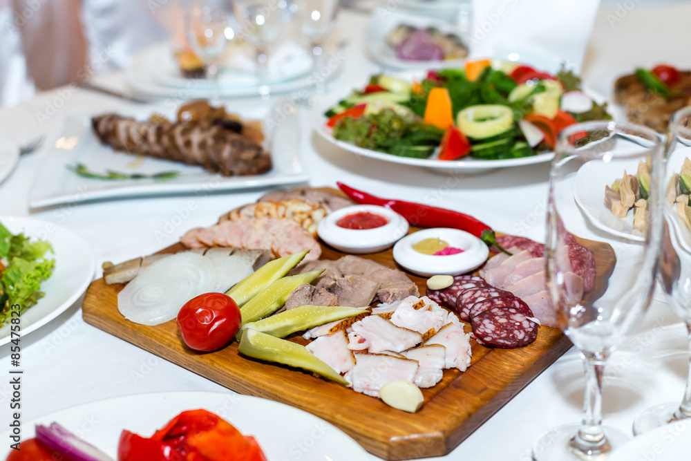 cold cuts on a banquet table