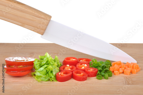 Ceramic knife and vegetables