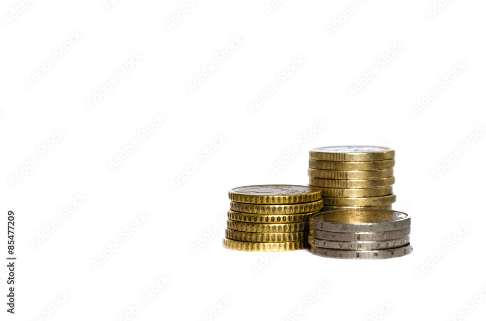 three different pile of euro coins, whit copy space on the left. over white three different pile of euro coins, whit copy space on the left. over white