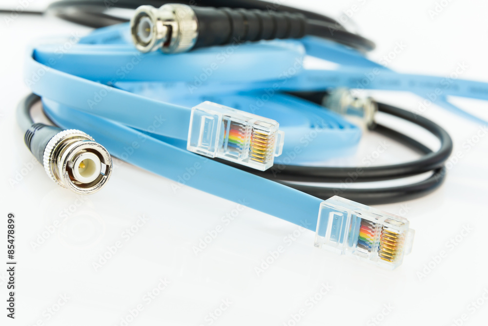 two flat console cables RJ45 and old BNC coaxial network cable Stock Photo  | Adobe Stock