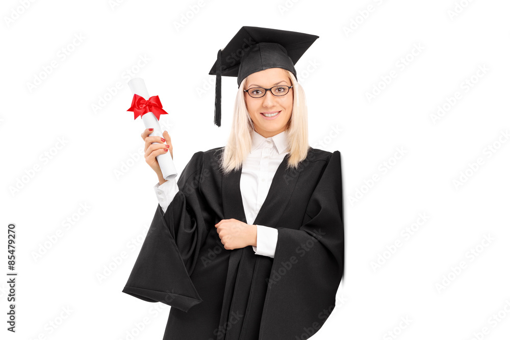 Female college graduate holding a diploma and leaning against a Female college graduate holding a diploma and leaning against a