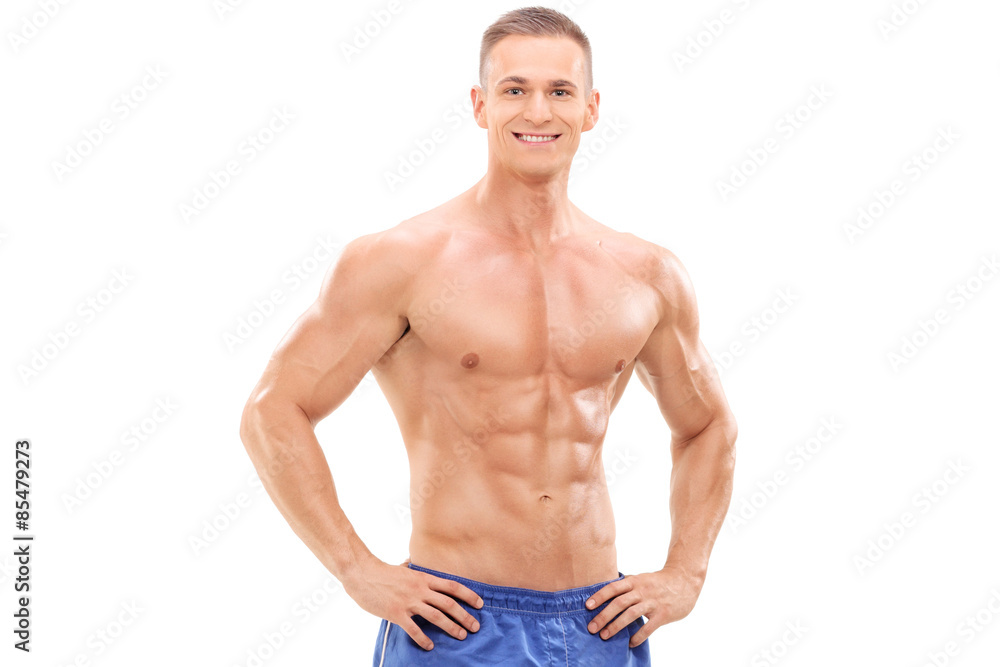 Handsome male athlete posing isolated on white Handsome male athlete posing isolated on white