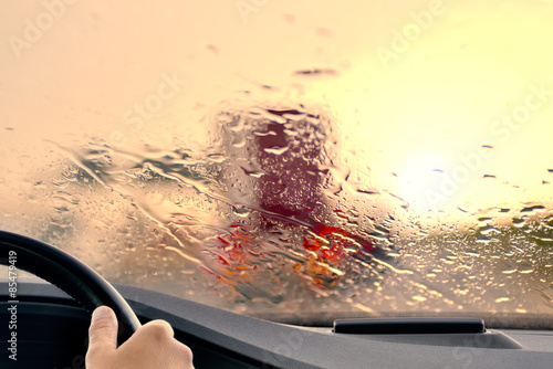 Driving on a Hiighway at Sunset when it starts to Rain photo