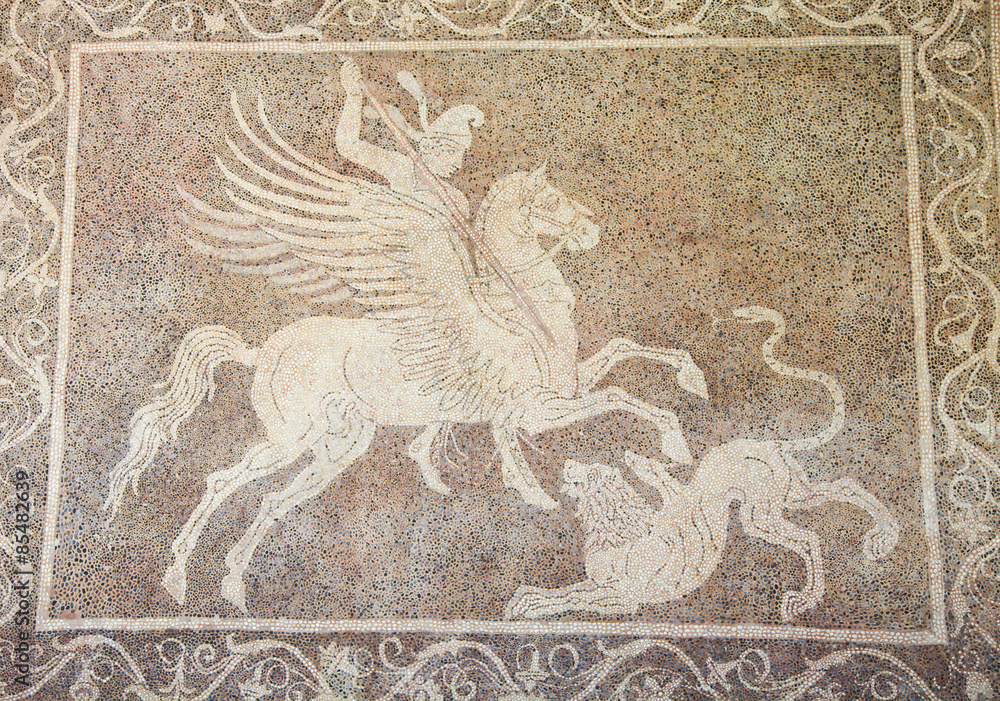 Mozaic of a horseman fighting a lion in Rhodes, Greece