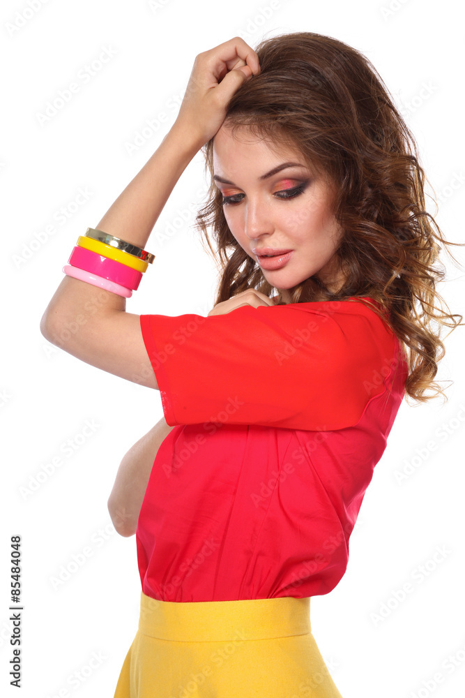 Beautiful woman with curly hair wearing a red jacket, isolated Beautiful woman with curly hair wearing a red jacket, isolated